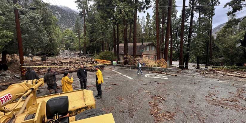 Mudslides trap drivers, bury roads and damage homes in Southern California