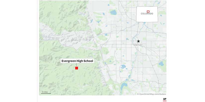 Authorities say student who had been radicalized fired revolver at Colorado school, wounding 2