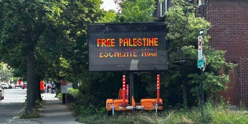 Montreal traffic signs apparently hacked to display pro-Palestinian political slogans