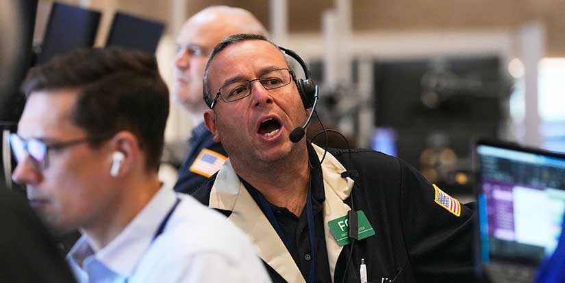 Wall Street holds near its records following the latest report showing the US job market is slowing